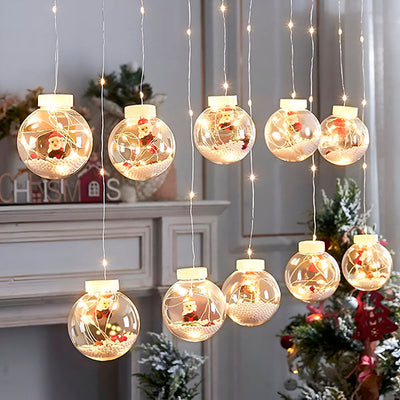 Christmas ball curtain lights glowing in a window
