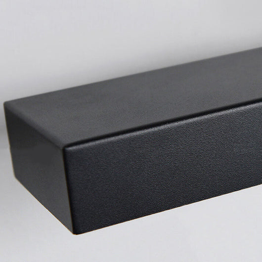 Black linear outdoor wall light on a fence panel