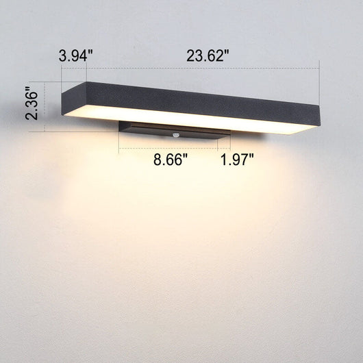 Outdoor sensor light illuminating a driveway and path