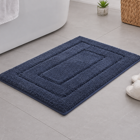 Geometric bath mat in front of a shower