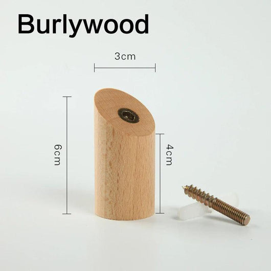 Angular solid wood wall hooks mounted in a row along a hallway
