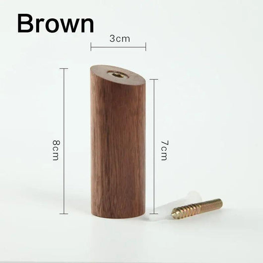 Timber wall hooks staggered across a wall in a modern interior