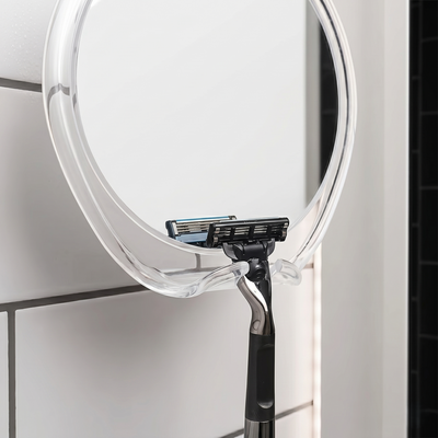Shower mirror swivel angle adjustment
