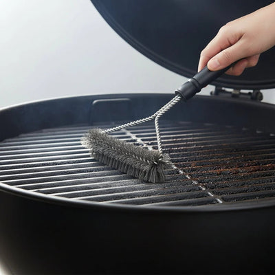Close up of stainless steel bristles on the grill brush