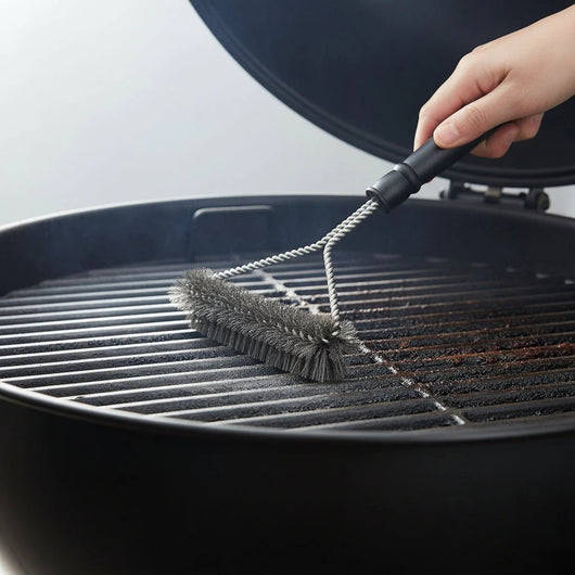 Close up of stainless steel bristles on the grill brush
