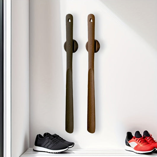 Wooden shoehorn snapped onto magnetic base in entryway