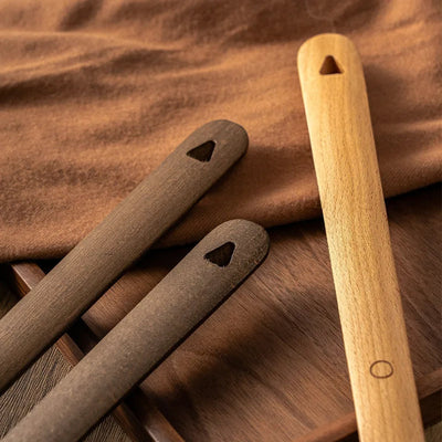 Wood shoehorn shown at full 50 cm length for scale