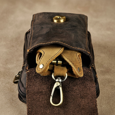 Dark brown leather waist pack back panel and strap detail