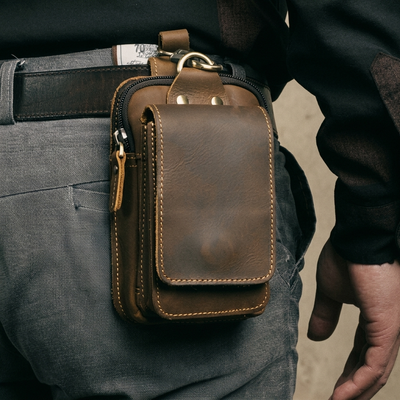 Dark brown leather waist pack studio product shot front view
