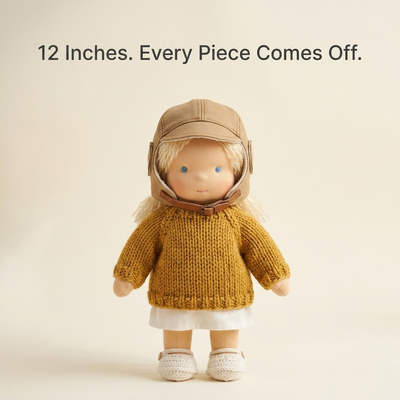 Waldorf style doll with 12 inches every piece comes off text overlay
