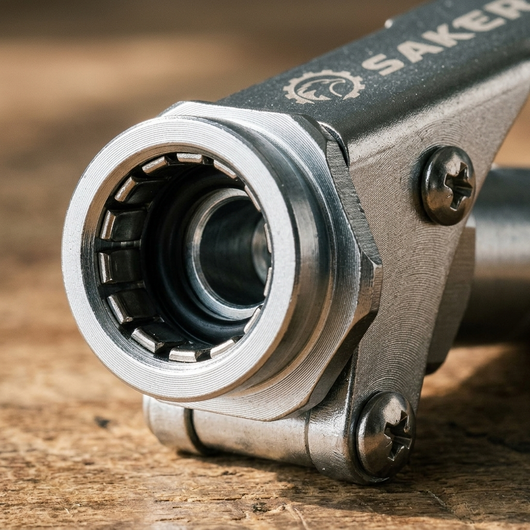 Close up of the jaws and side lever on the zinc plated grease coupler